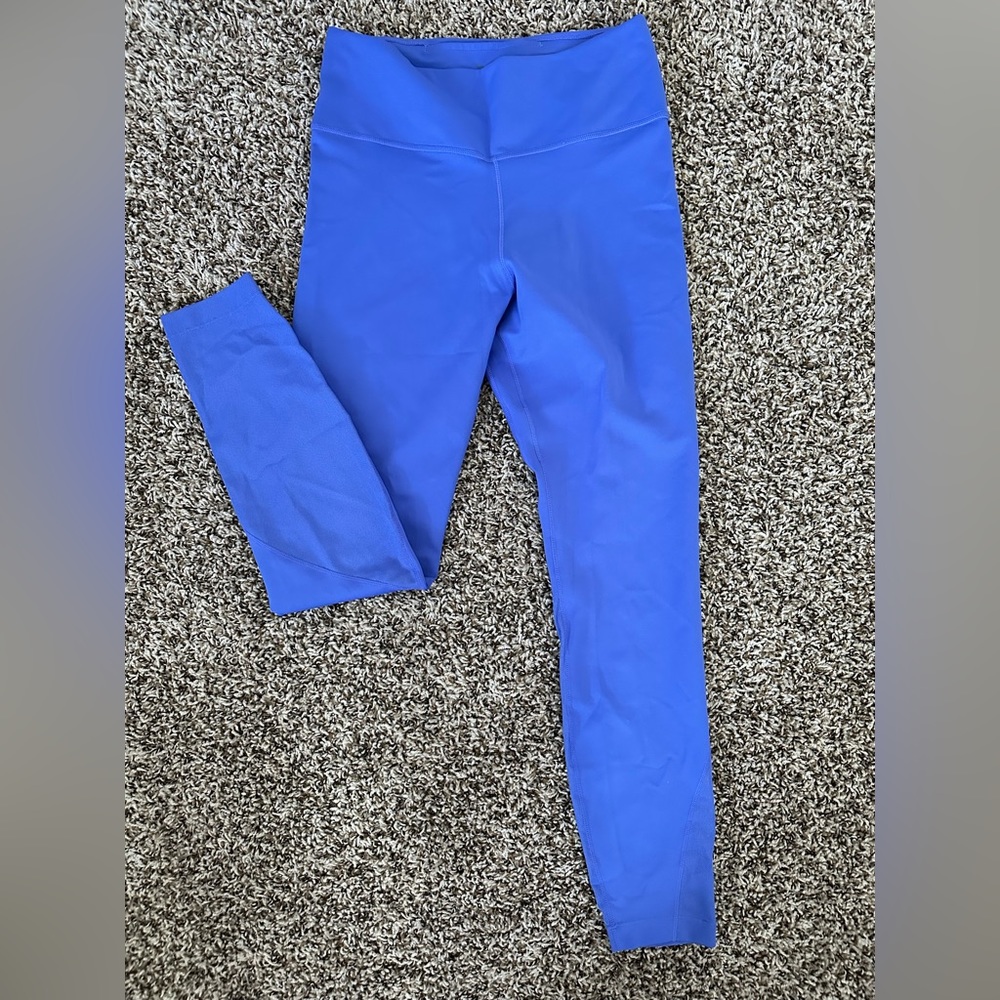 Nike Bright Blue Leggings with lower mesh around the calves